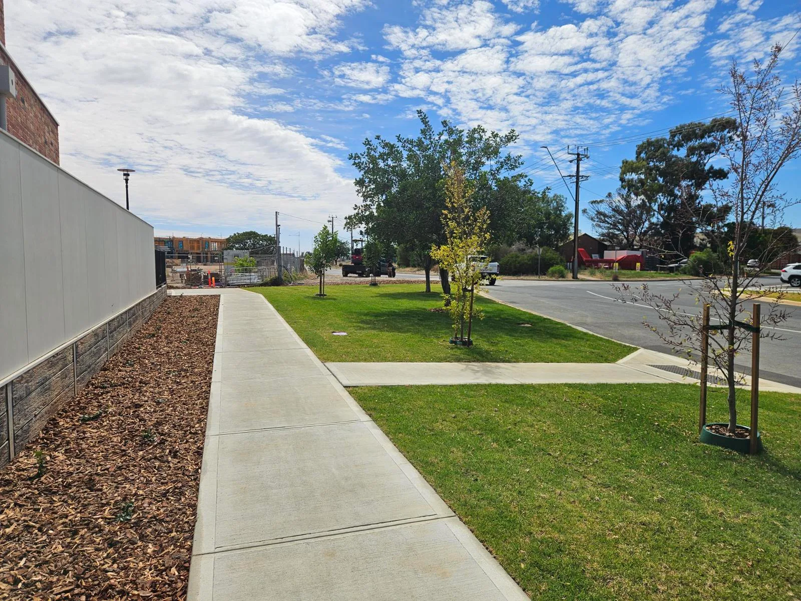 Footpath verge finished with turf and a mulched garden strip